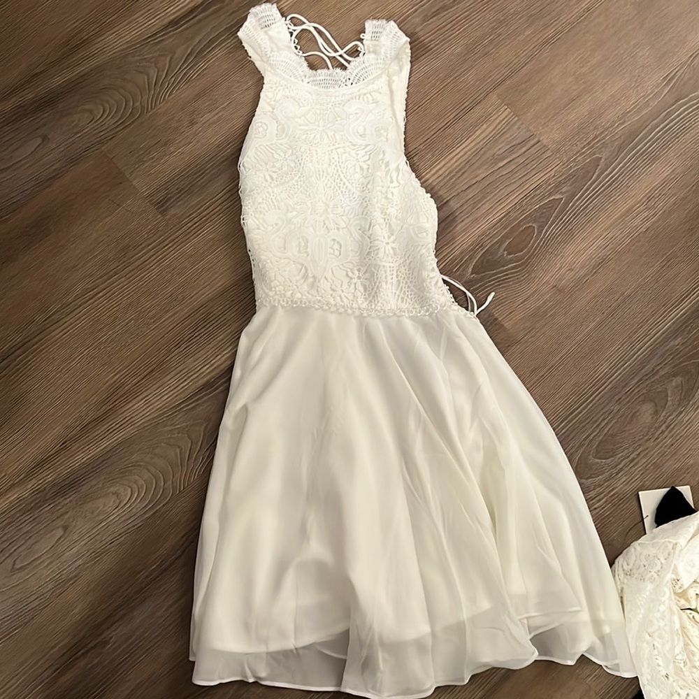 Never worn two sisters white dress with tie up back